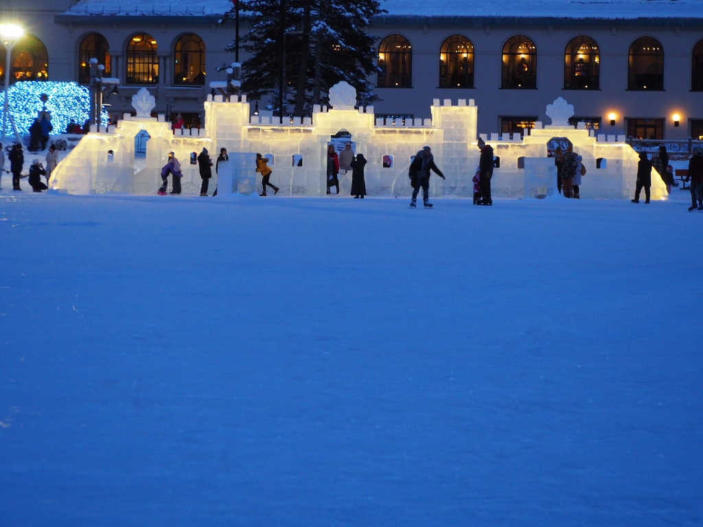 "Ice Magic", ice sculpture constructed on the frozen Lake Louise lake in front of the Fairmont Chateau, January 1, 2024.